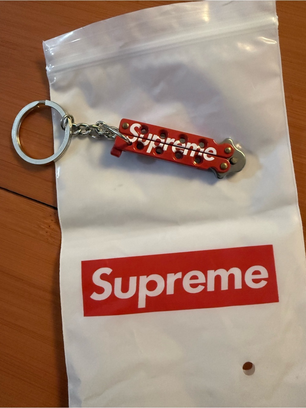 Supreme Red Mini Butterfly Keychain with White Logo